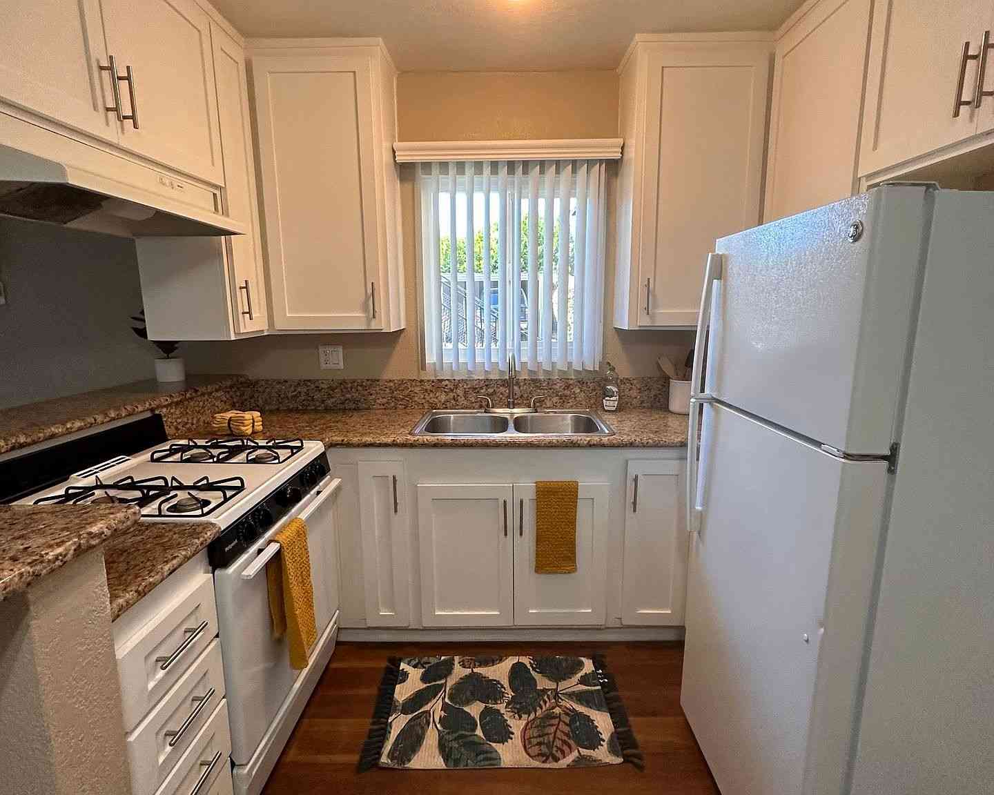 renovated kitchen with granite countertops