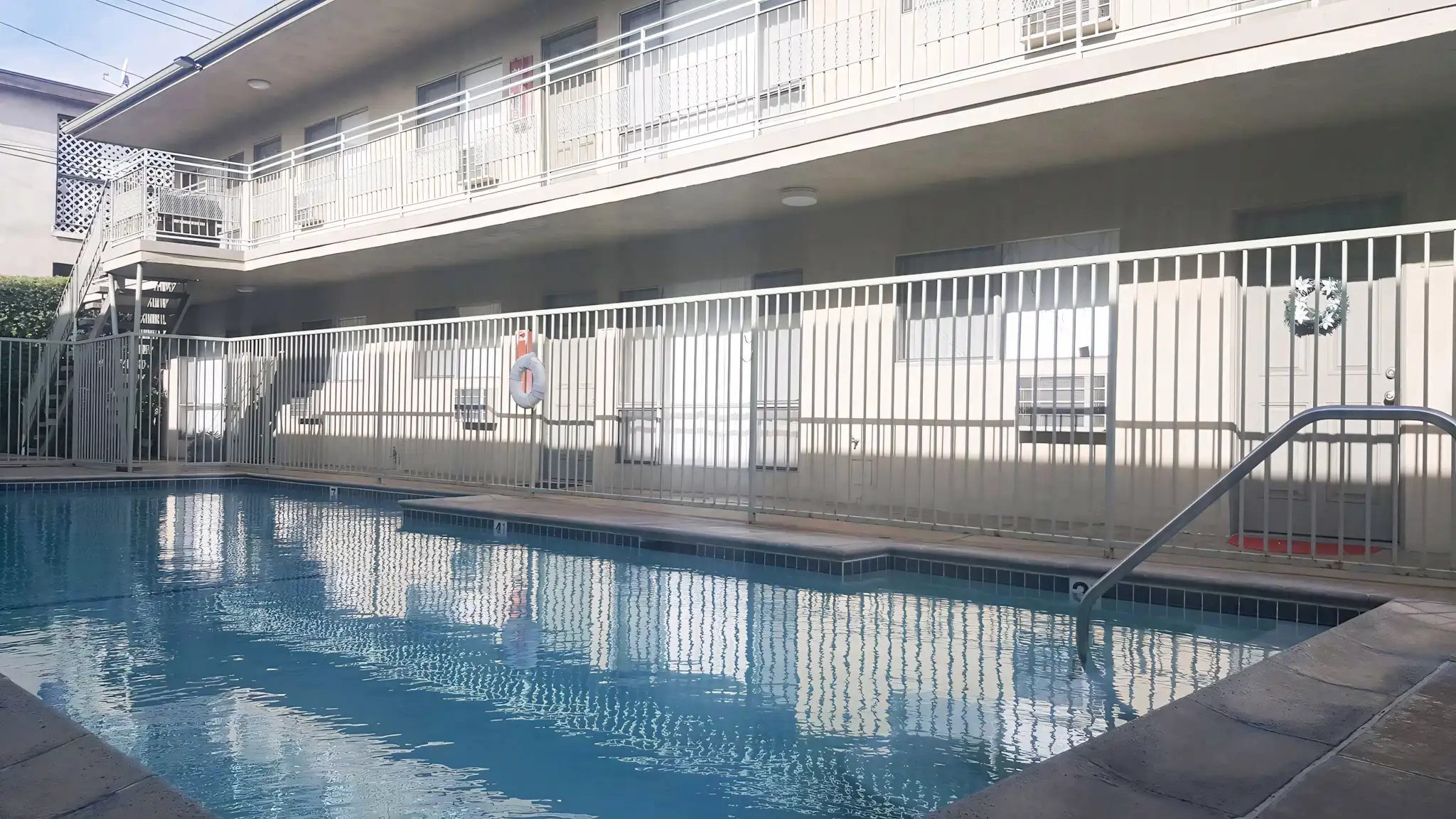 Palma Imperial I gated swimming pool and resident walkways